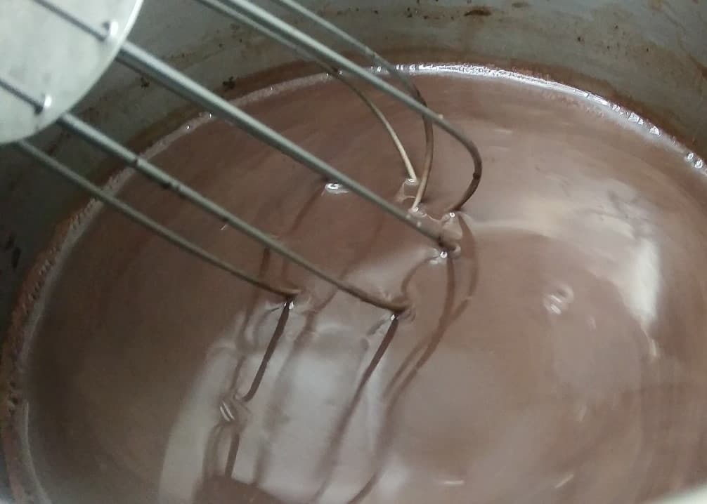 boil the milk till chocolate melts