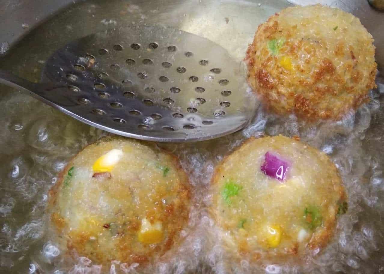 Frying of corn cheese balls