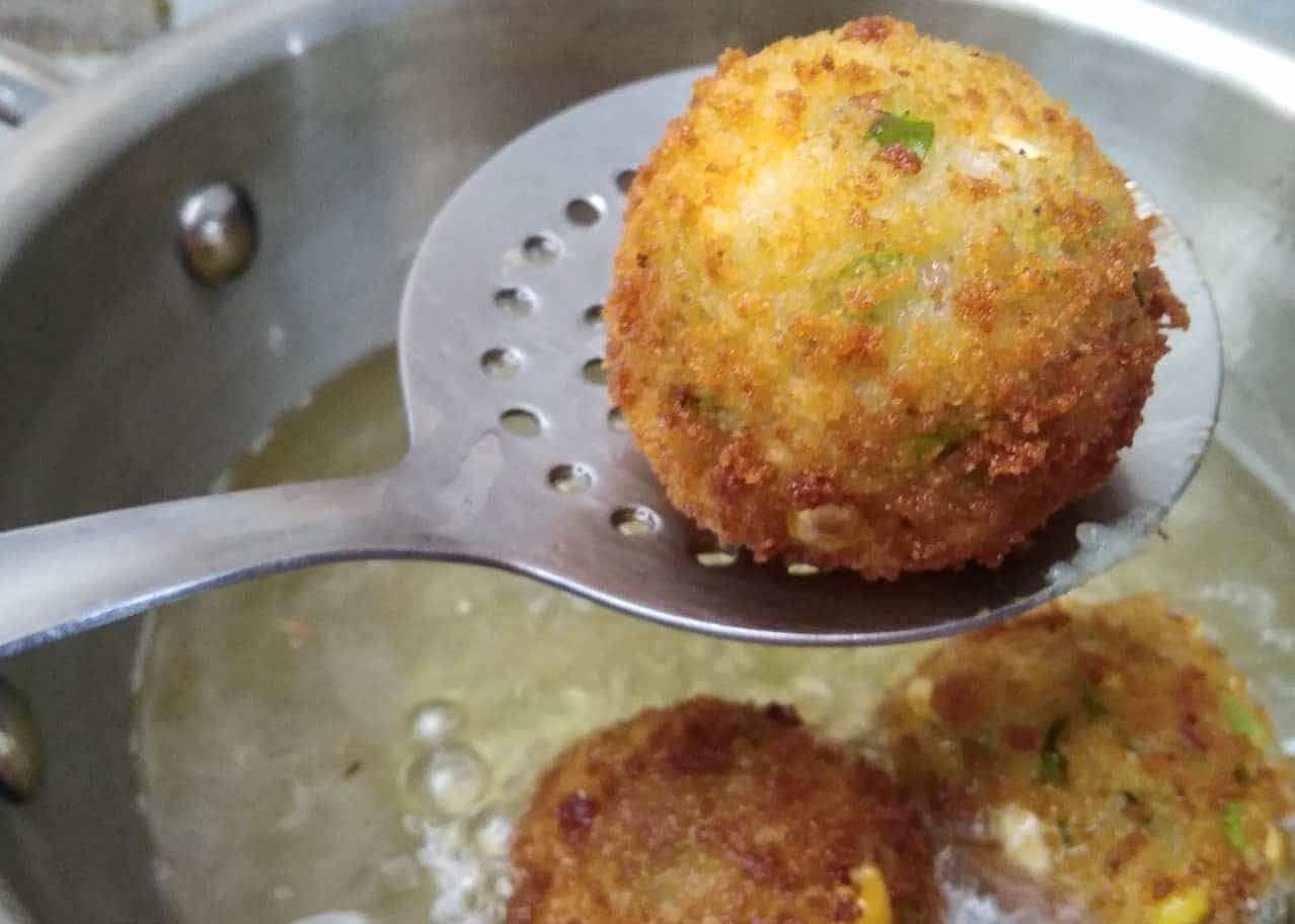 Frying of corn cheese balls